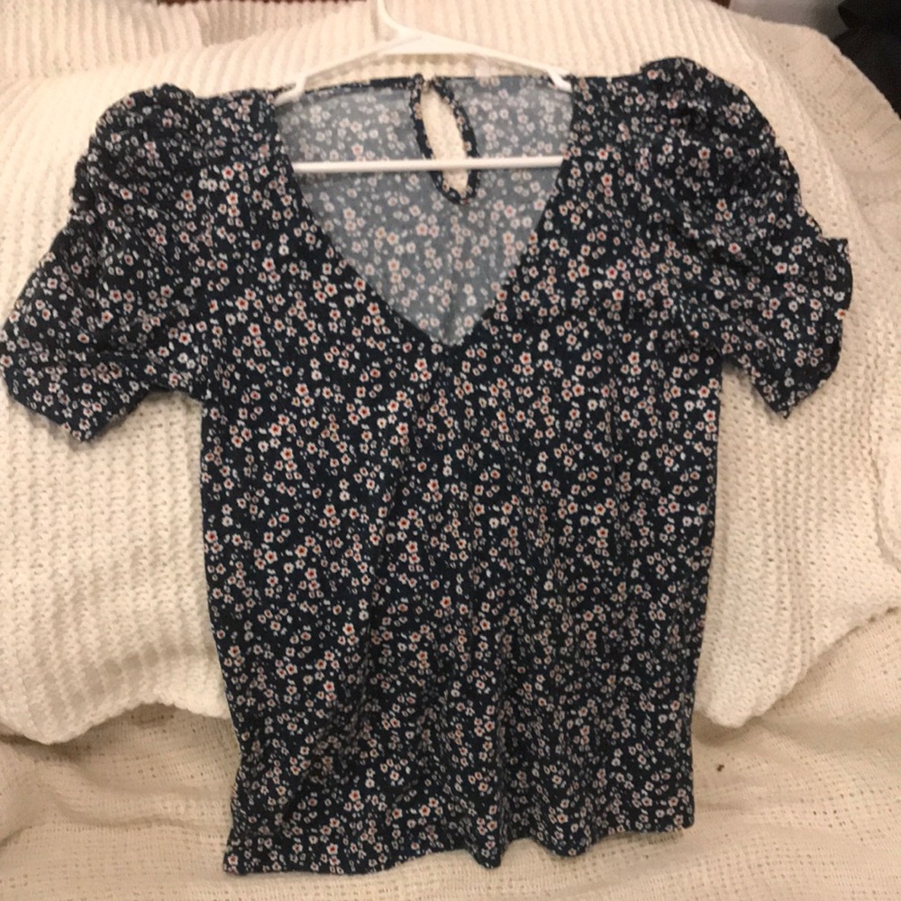 dna couture.size: small.color:emerald green with small white floral pattern.